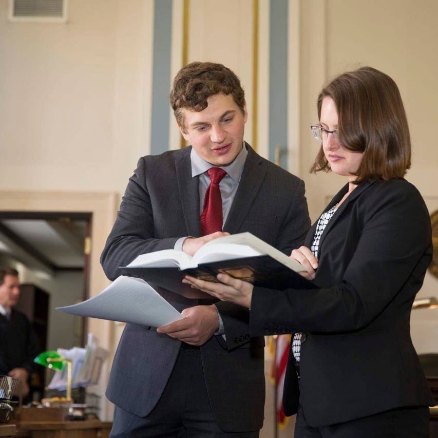 College of Law student Maxel Moreland working with 2nd year Law student Jackie Miller at the Courthouse in Judge Robert Winkler's Courtroom.