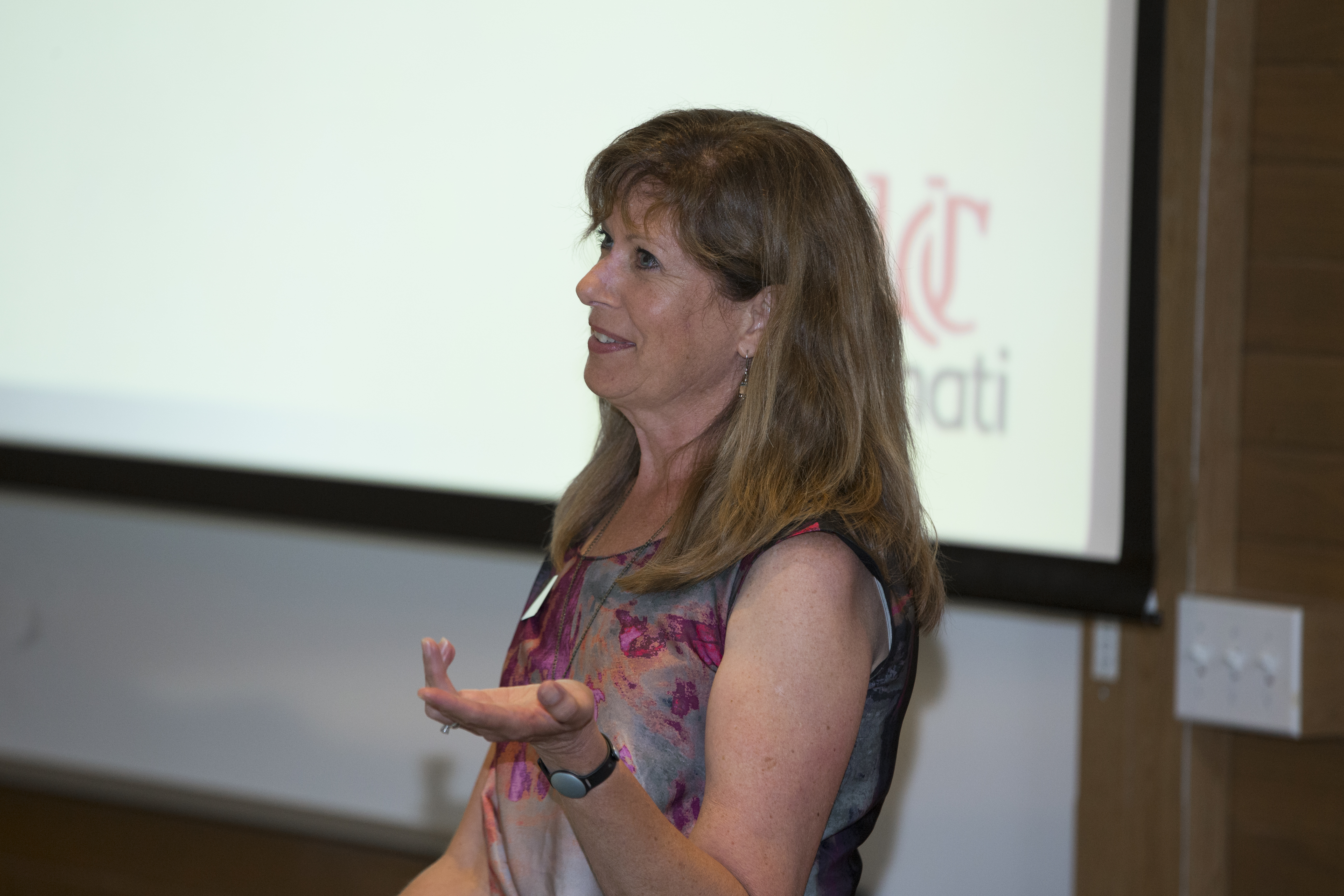 Professor Betsy Malloy welcomes a class of law students.