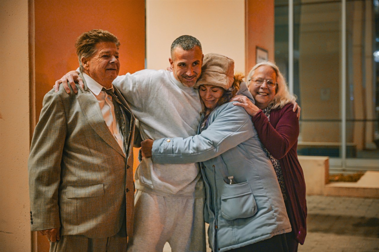 OIP's 37th exoneree Alan Butts celebrates his freedom with his family. 