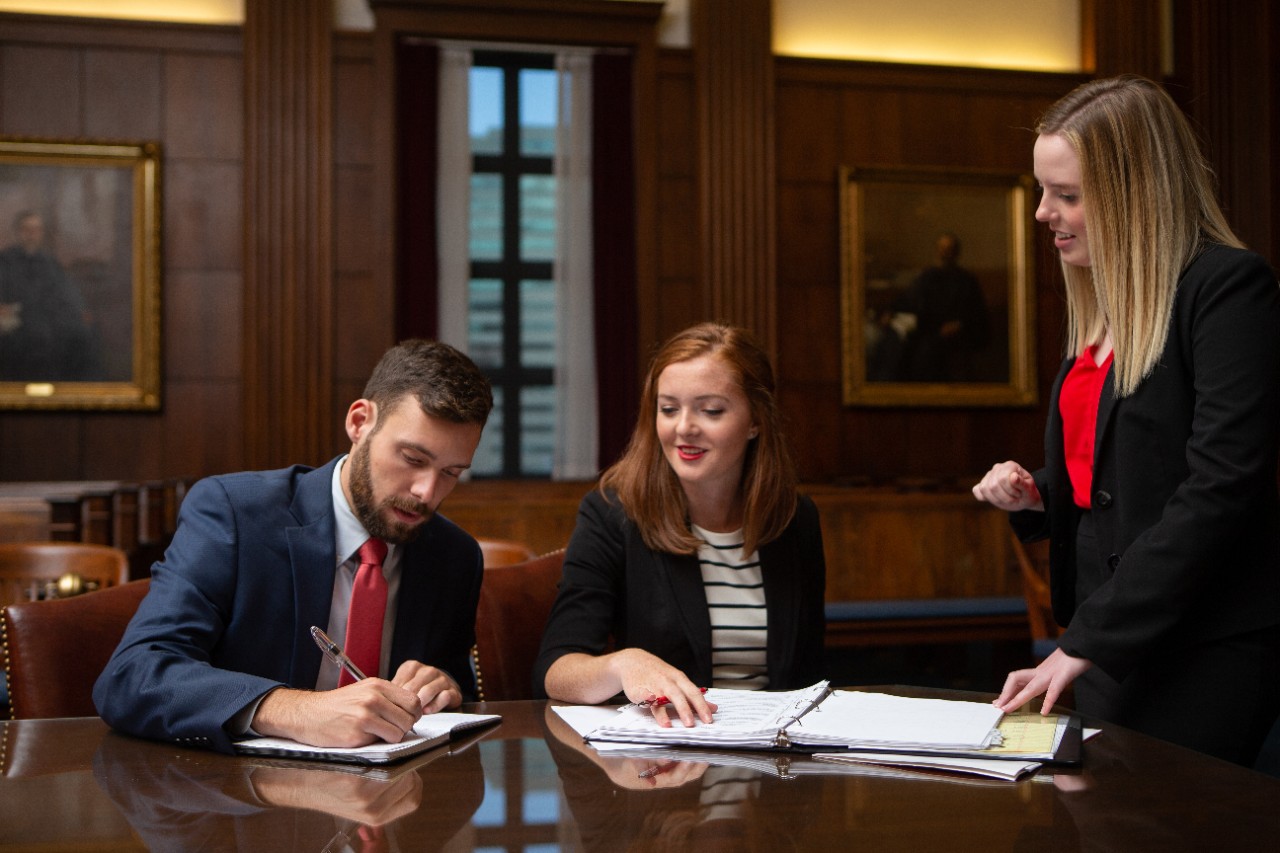 Law students in a courtroom.