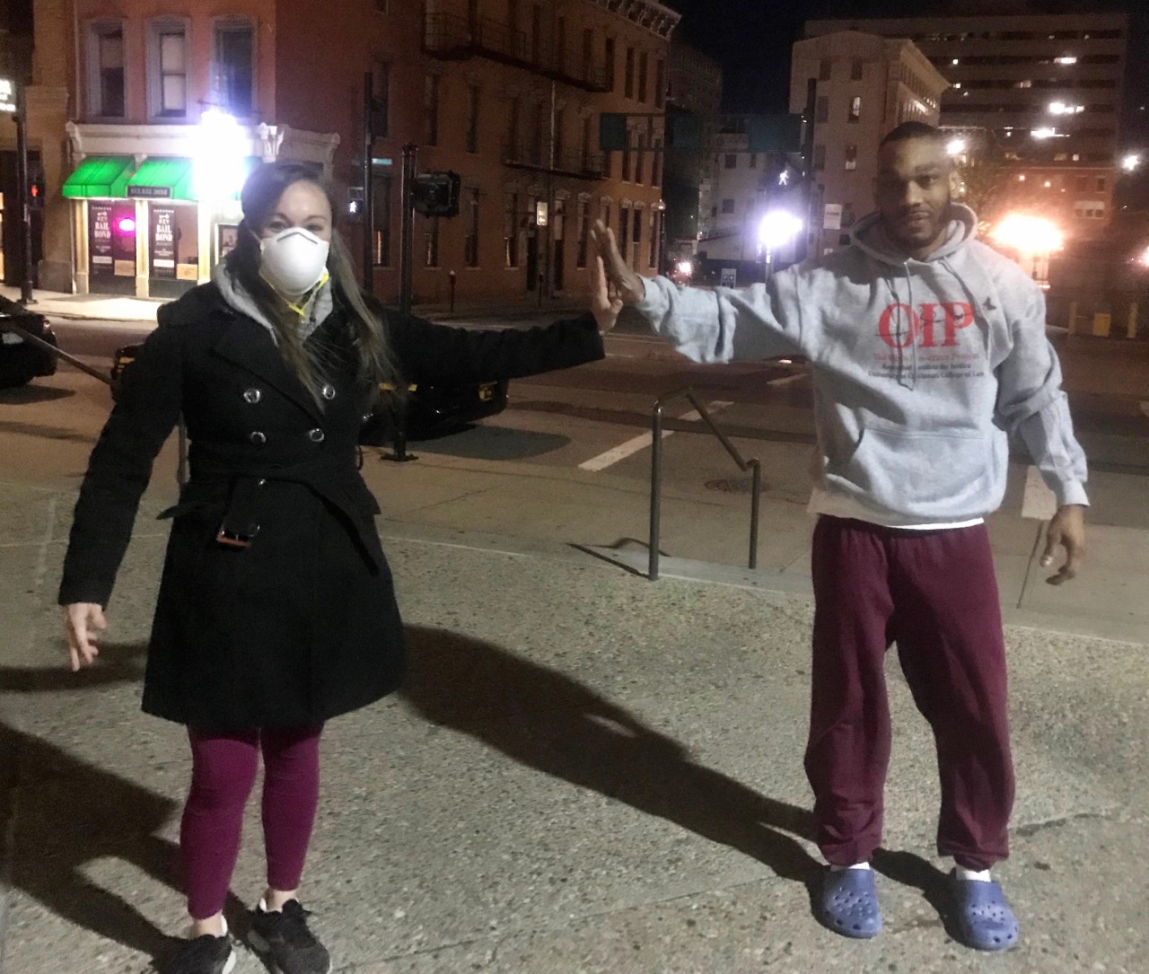 Chris Smith air fives with his attorney after being freed amidst the COVID-19 pandemic.